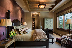 master bedroom of luxury timber frame home in Montana