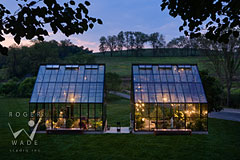 glass and steel greenhouses on Pennsylvania farm at twilight