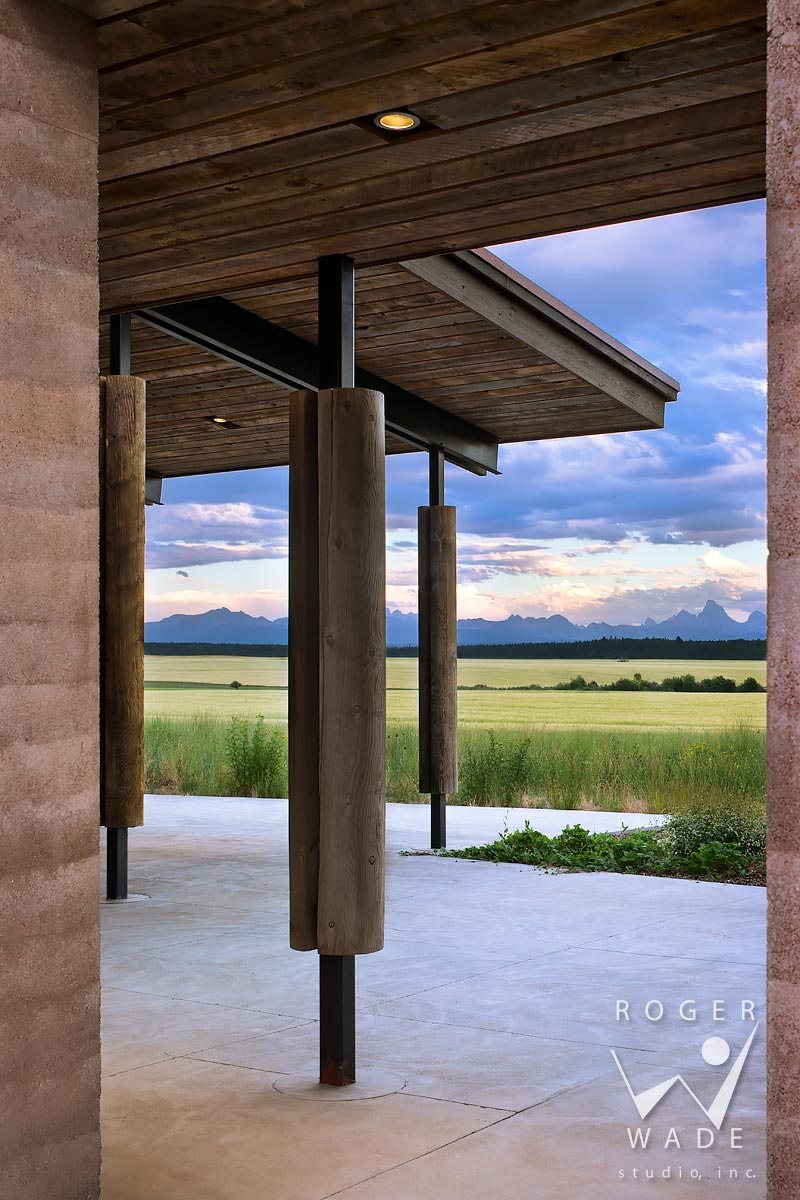 contemporary rustic architecture image, breezeway looking out to farmland and mountains, squirrel, id