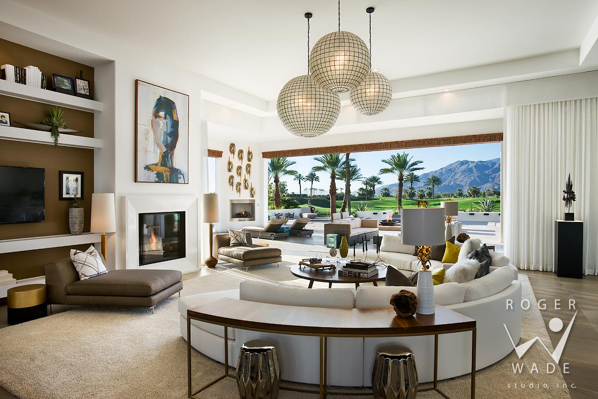 contemporary interior design image, living room looking out to rear patio, pool and golf course with santa rosa mountains in distance, la quinta, ca