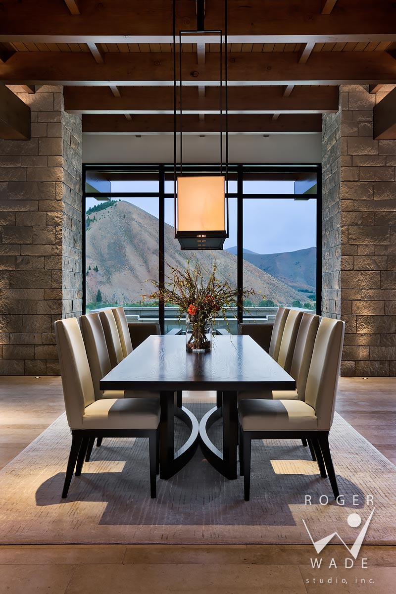 modern mountain interior photography, dining room looking out windows to mountain view, ketchum, id