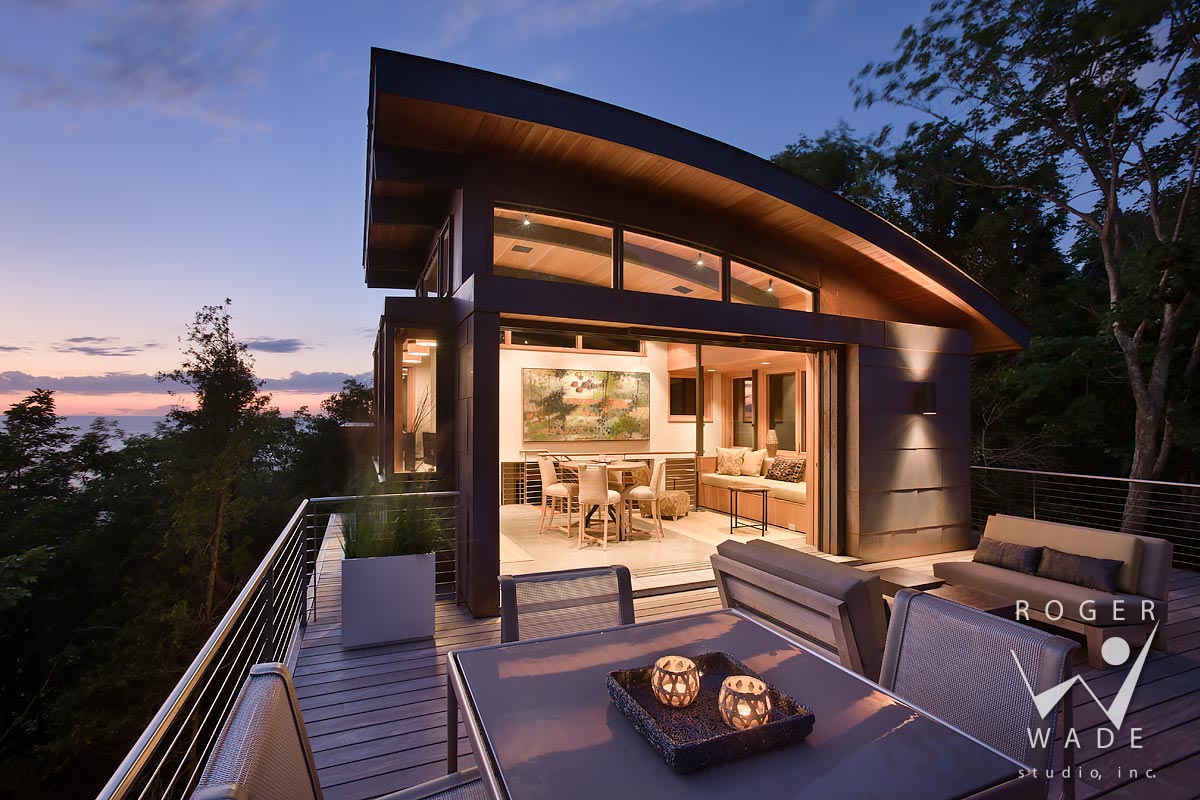 image of contemporary architecture, roof top deck and lounge looking out to lake michigan at twilight, whitehall, mi
