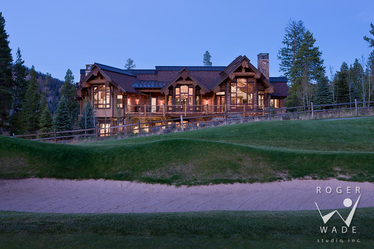 log home photo, rear elevation at twilight from golf course, breckenridge, co