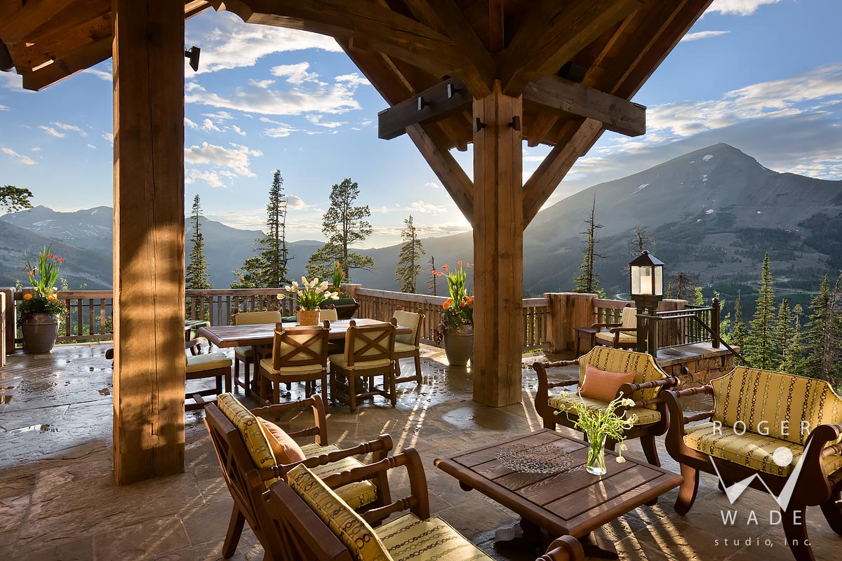 covered patio looking out to lone peak view, yellowstone club, mt