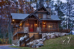 small milled log home cabin with fall colors