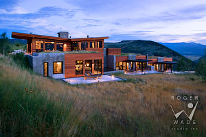 contemporary luxury mountain home at twilight for Architectural Digest
