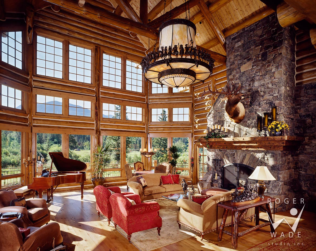 photography of luxury log home lodge, great room looking out windows, bigfork, mt