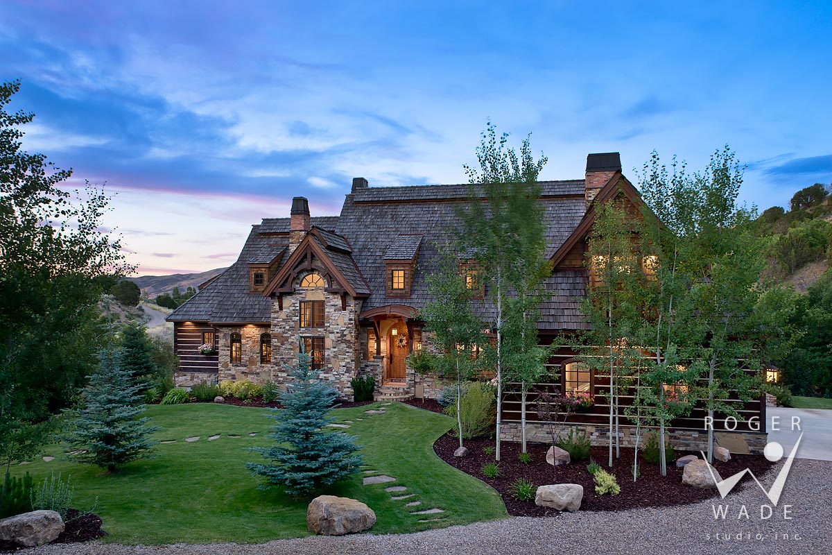 photograph of overall front elevation of hybrid log home at twilight, pocatello, id 