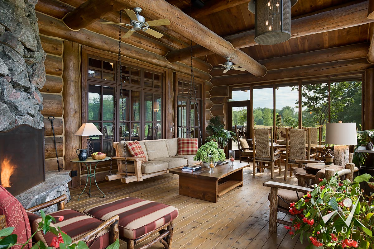 log cabin image, screened porch sitting area with fireplace, lakeside, mi